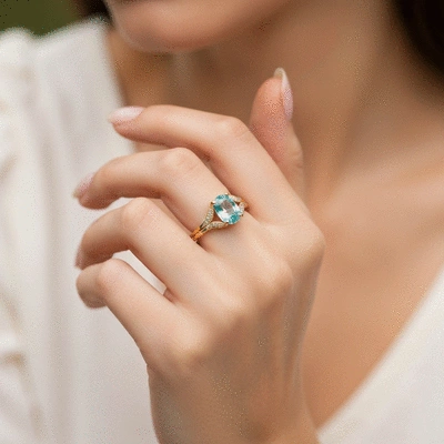 Aquamarine engagement ring on a hand