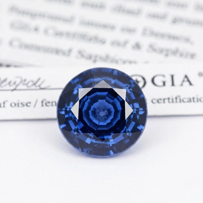 GIA certified blue sapphire gemstone with certification document