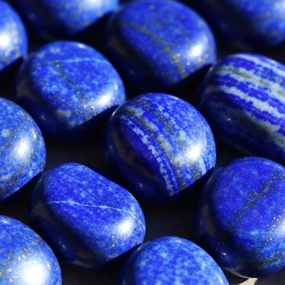 Close-up of lapis lazuli gemstones showcasing deep blue color and subtle violet hints