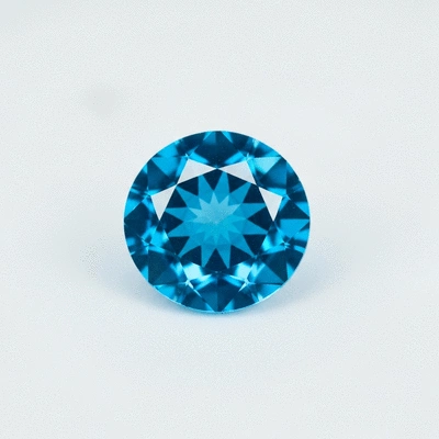 Close-up of a vibrant London Blue Topaz gemstone, sparkling, with no text, no words, no typography