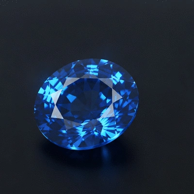 Close-up of a blue sapphire gemstone, sparkling with facets