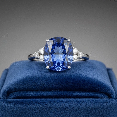Luxurious tanzanite ring with diamond accents on a velvet display