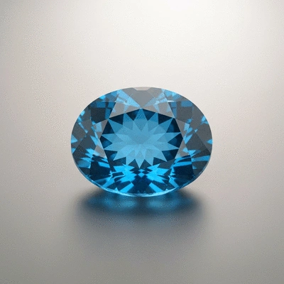 Close-up of a single polished blue gemstone on a neutral background